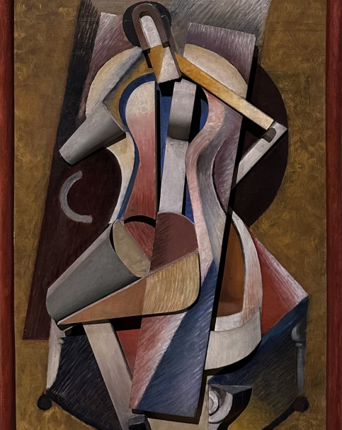 Alexander Archipenko 1887-1964. Woman in Armchair, 1918. Painted wood and painted sheet metal and found objects. Support: oil on wooden panel. Tel Aviv Museum of Art. Photo Dan Daniel